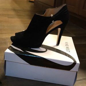 Nine W. size 11 peep toe  heels.
